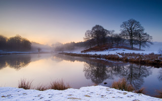 Lake snowy forest foggy winter - a hill in the distance free wallpaper