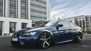 Blue car building sky clouds - a blue car free wallpaper for desktop