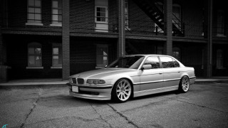 Silver car building stairs fire - a silver car free wallpaper