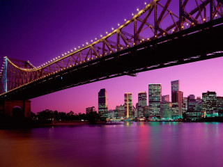 Bridge city night lights matte - a bridge over a body of water free wallpaper