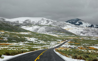 Snowy mountain road matte painting - a yellow line free wallpaper
