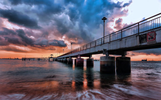 Bridge water sky clouds light - a bridge over a body of water free wallpaper for desktop