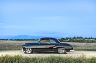 Black car dirt road field - don eddy free wallpaper