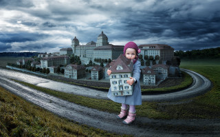 Little girl doll building road - a little girl holding free wallpaper