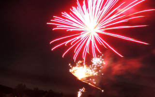 Fireworks red white explosion sunset - free new year wallpaper