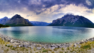 Lake mountains cloudy sky rocks 2 - mountain under a cloudy sky free wallpaper