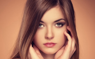 Woman long hair brown background - shaded free wallpaper for desktop