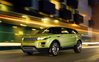 Green range rover night city - motion free wallpaper