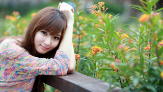 Woman leaning on rail flower - girl free wallpaper