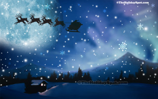 Santa sleigh flying snowy landscape - over a snowy landscape free wallpaper