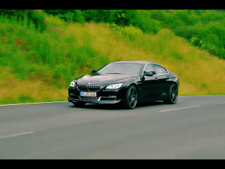 Black car road green hillside - ahmed yacoubi free wallpaper