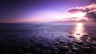 Purple sky reflection beach mountains - rock and pebbles free wallpaper