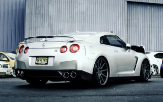 White sports car building background - other car free wallpaper