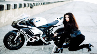 Woman sitting motorcycle street helmet - the ground next free wallpaper
