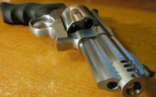 Gun metal barrel black grips - a black handle free wallpaper for desktop