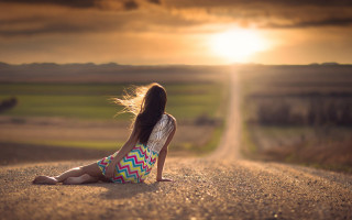 Girl sitting road sunset blowing - the side of a road free wallpaper for desktop