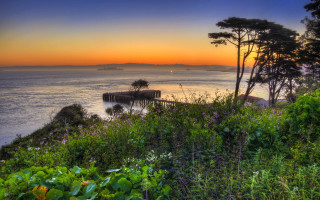 Sunset dock trees water boat - the foreground and a body of water free wallpaper for desktop