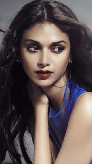 Woman long hair blue top 2 - a blue top free wallpaper