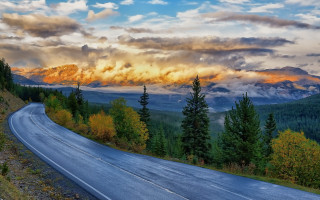 Mountain road clouds trees sky - beautiful landscape free wallpaper for desktop