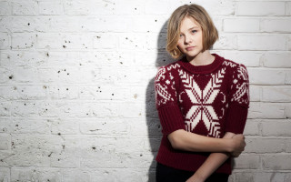 Woman red sweater white brick - christabel dennison free wallpaper