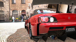 Red sports car brick building 2 - a black roof free wallpaper