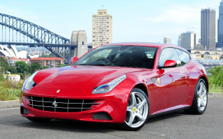 Red sports car bridge city - photorealism free wallpaper for desktop