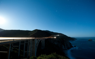 Bridge water mountain night city - free airplane wallpaper