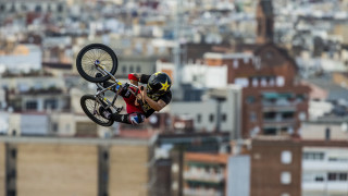 Man bike ramp city skyline - motion blur free wallpaper