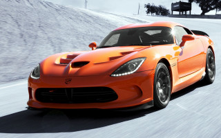 Bright orange sports car snowy - unreal engine 5 free wallpaper