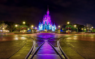 Castle train track night christmas - a clock tower in the background free wallpaper