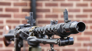 Machine gun brick wall precisionism - 30mm free wallpaper