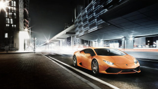 Orange sports car night cityscape - nice looking orange sports car free wallpaper