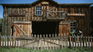 Wooden barn picket fence gate - the side of the building free wallpaper