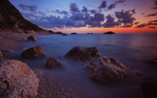 Mystical beach rocks water sunset - constantine andreou free wallpaper