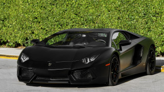Black sports car parked 3d - a black sports car free wallpaper