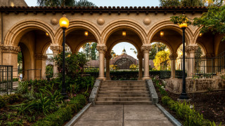 Stone archway clock tower garden - a stone walkway free wallpaper