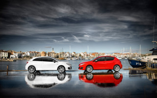 Two cars waterfront cityscape promotional - two car free wallpaper