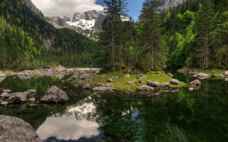 Mountain lake forest rocks snow - a mountain lake free wallpaper