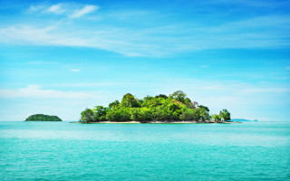 Small island ocean trees boat - side and a boat free wallpaper