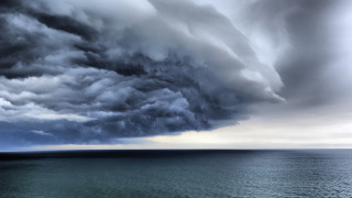 Storm cloud ocean boat matte - the water below free wallpaper
