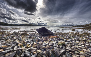 Rock beach large planet clouds - a large rock in the middle of it free wallpaper