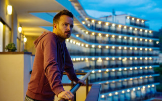 Balcony urban cityscape hooded man - zdarsky free wallpaper