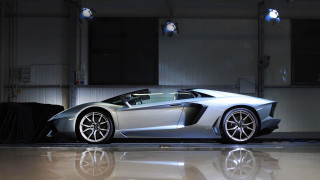 Silver sports car garage chrome 2 - a black cloth free wallpaper