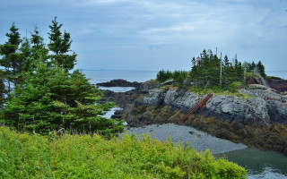 Rocky shore lighthouse trees water - a rocky shore free wallpaper for desktop