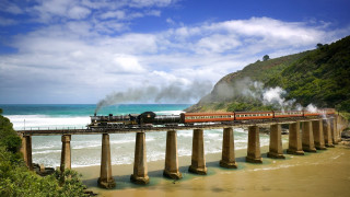 Train bridge ocean waves mountain - a train free wallpaper for desktop
