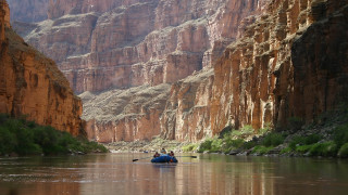 River canyon boat kayak cityscape - daren bader free wallpaper