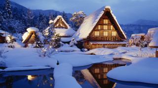 Snowy village night pond houses - a pond free wallpaper