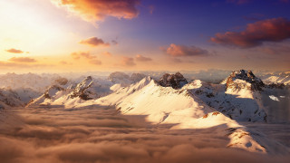 Mountains clouds sunset horizon ocean - free winter wallpaper
