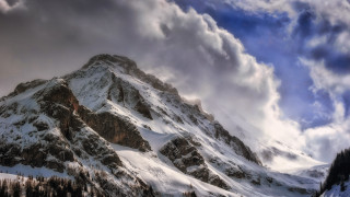 Snowy mountain cloudy sky trees - the top of the mountain free wallpaper
