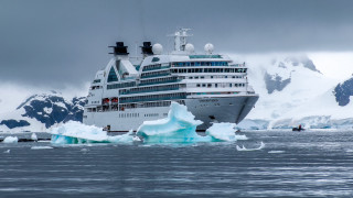 Cruise ship icebergs mountain scenery - a cruise ship free wallpaper